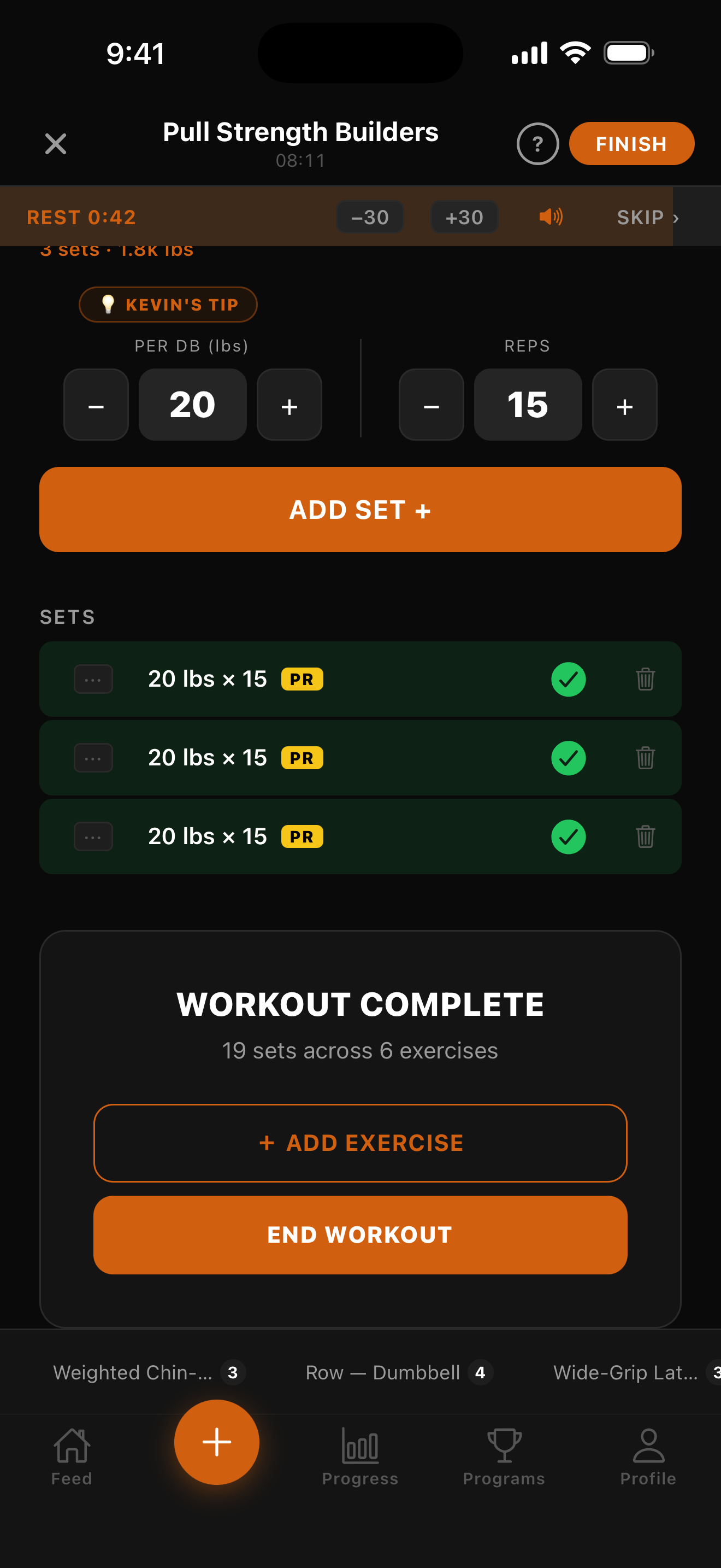 Active workout screen with PR badges and WORKOUT COMPLETE banner